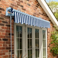 2.5m Standard Manual Awning, Blue And White Stripe 10 2.5m Standard Manual Awning, Blue And White Stripe -Primrose Awnings Standard blue and white sml 1