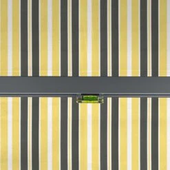 4m Standard Manual Yellow And Grey Awning (Charcoal Cassette) 13 4m Standard Manual Yellow And Grey Awning (Charcoal Cassette) -Primrose Awnings awn standard charcoal yellowgreystripe 5 55e1916d 6779 4614 97c3 bbc2ff1e521c