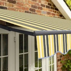 4m Standard Manual Yellow And Grey Awning (Charcoal Cassette) 12 4m Standard Manual Yellow And Grey Awning (Charcoal Cassette) -Primrose Awnings awn standard charcoal yellowgreystripe 6 8c53b930 89fe 4c4f 9d4a 1e4f9a67da7a